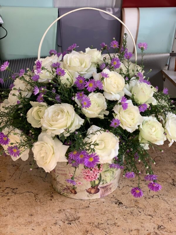 Metal seat with white roses